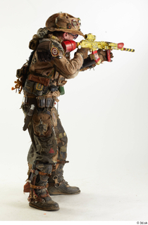 Photos Ryan Sutton in Postapocalyptic Suit shooting aiming gun gun…